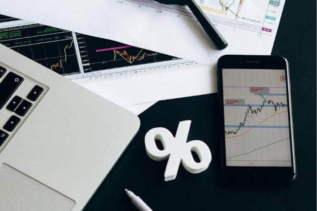 Financial workspace with charts, what is interest - stock data, and a percent symbol